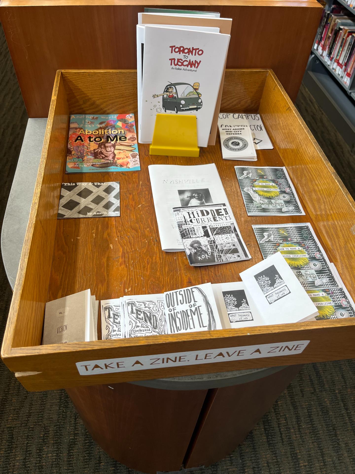 take a zine, leave a zine bin in upstairs graphic novel area at Main Library